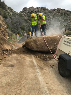 Crew removing a boulder from SR 89 on Monday