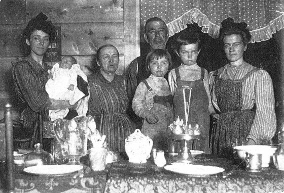 Example of a historic photo to be cataloged as part of this grant is this image of Sedona Schnebly (right), two of her children and other family members during a holiday visit and meal in her Sedona, Arizona home, ca. 1902-05.