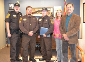(LtoR) Peter Tyson, Douglas Seavey, and Mark Miller along with Volunteer Services Coordinator Dennyse Loll and Sheriff Mascher