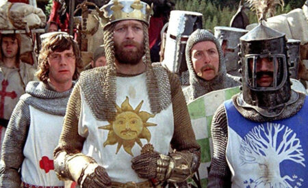 “Monty Python and the Holy Grail” is a 1975 British comedy film written and performed by Monty Python (Graham Chapman, John Cleese, Terry Gilliam, Eric Idle, Terry Jones, and Michael Palin) and directed by Gilliam and Jones in their feature directorial debuts. The film parodies the legend of King Arthur’s quest for the Holy Grail.