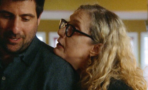 A cantor (Jason Schwartzman) in a crisis of faith finds his world turned upside down when his former grade school music teacher (Carol Kane) re-enters his life as his new adult bat mitzvah student.