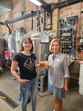 Toasting to the success of the upcoming Toast the Trails event is Allyn Backus, manager of Smelter Town Brewery and Dreama Aldredge, director of the Sedona Red Rock Trail Fund.