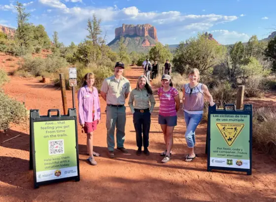 Launching the new NFF/SRRTF trail stewardship campaign are Amanda Maxwell (SRRTF director), Kevin Kuhl and Holly Cliché (Red Rock Ranger District), Tracy Randall and Kelley Malek (SRRTF directors).