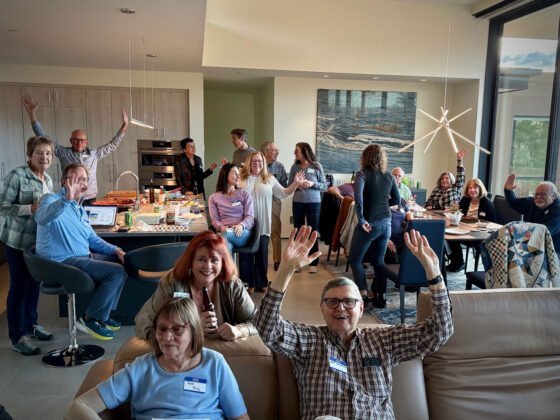 Village Rotarians Celebrate Raffle Winner at home of Patti & Roger May