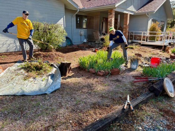 Rotarians and Firefighters Unite to Help a Neighbor in Need Rotarians Brad Parker and Jennette Bill
