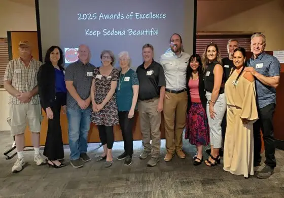 From left to right: Dooley Clickner, Cathy Johnson, Mike Freet, Peggy Chaikin, Anna May Cory, John Snickers, Bryce Beck, Alexandra Pfab, Raluca Mihalcescu, Craig Swanson, Martha Bruening and Cory Bruening.