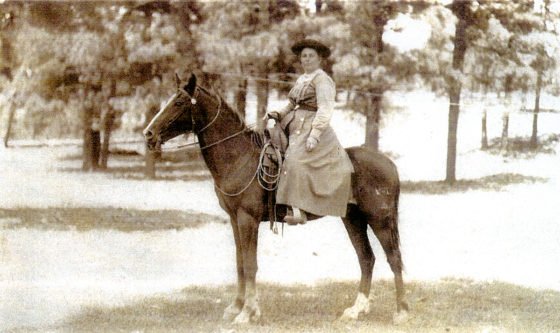 Nettie Van Deren on her horse Chipmunk, on her way to deliver another Oak Creek Canyon baby.