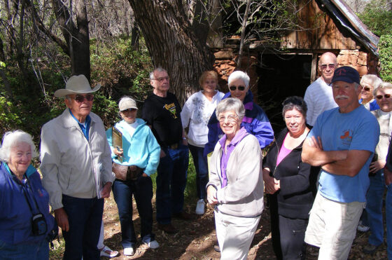 Guests on tour of Oak Creek Canyon’s historic places, Thompson Springhouse.