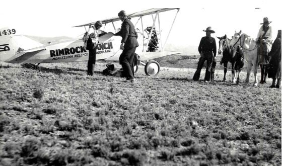 Russell Boardman (far left) with his TravelAire at Rimrock Ranch. The photograph was taken by Romaine Lowdermilk. Photo courtesy of Arizona Historical Society.
