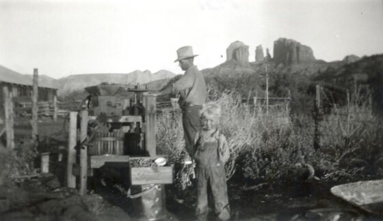 Claire Jones presses grapes at the Schuerman vineyards off the Lower Red Rock Loop Road